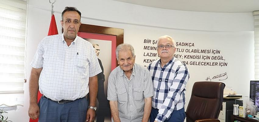 Burhaniye Kuyumcu Mahallesinde aşevi yapılması için protokol imzaları atıldı.